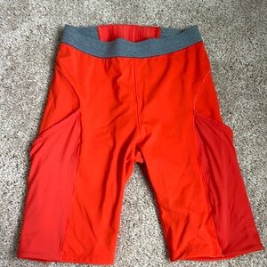 lululemon lab neon orange biker shorts